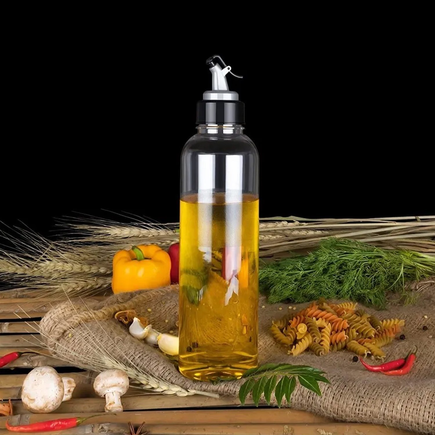 1-liter oil dispenser, transparent plastic, for kitchen use. 1-liter oil dispenser, transparent plastic, for kitchen use.